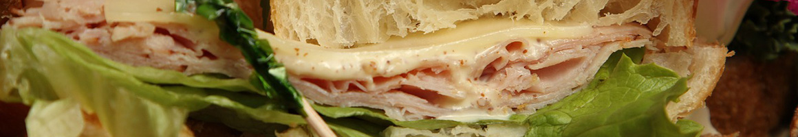 Eating Deli Italian Sandwich at Christine's Deli restaurant in Kailua-Kona, HI.